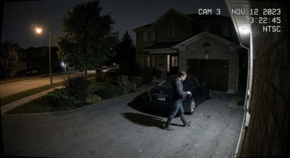 Car theft: Camera alert cleared by generative AI. Person escalated for analysis; Gen AI clears it — the owner approaching their car with keys.