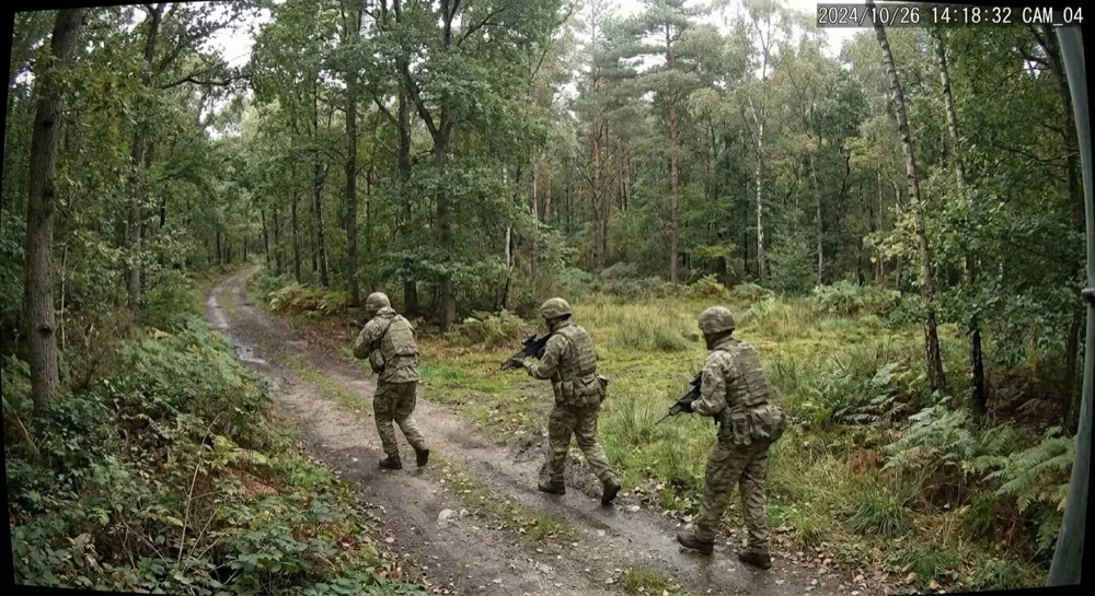 Defence: Generative AI raises alert. Gen AI confirms suspicious activity — personnel in military fatigues, at least one armed.