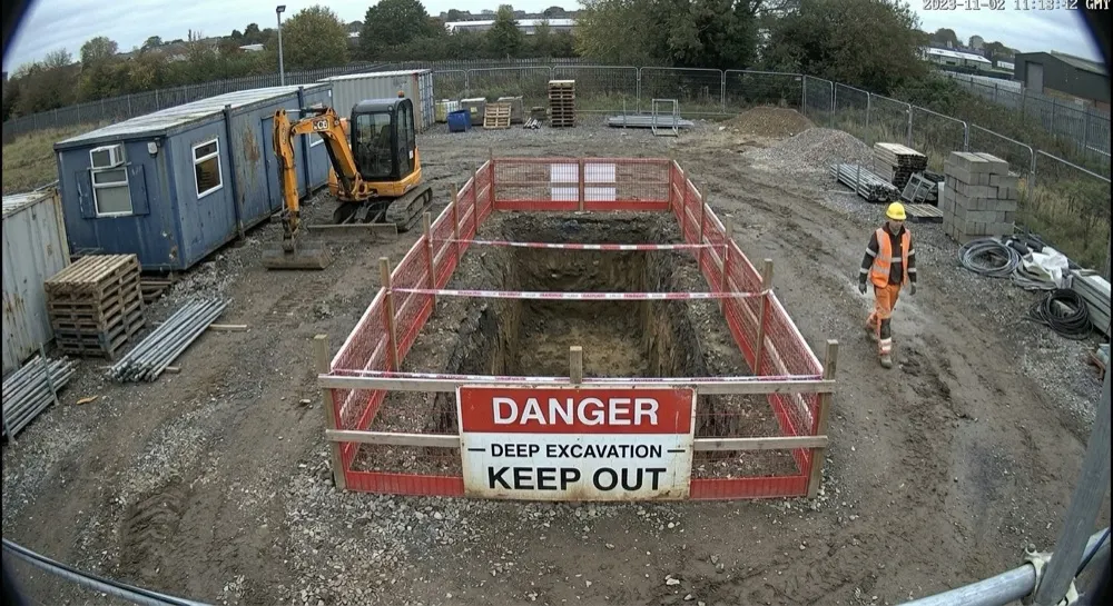 Exclusion zone: Camera alert cleared by generative AI. Person escalated for analysis; Gen AI clears it — a worker in PPE remaining outside the exclusion zone.