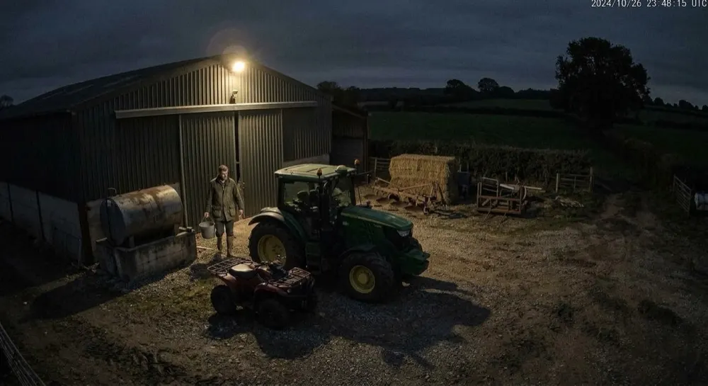 Farm machinery theft: Camera alert cleared by generative AI. Person escalated for analysis; Gen AI clears it — the farmer on routine evening work.