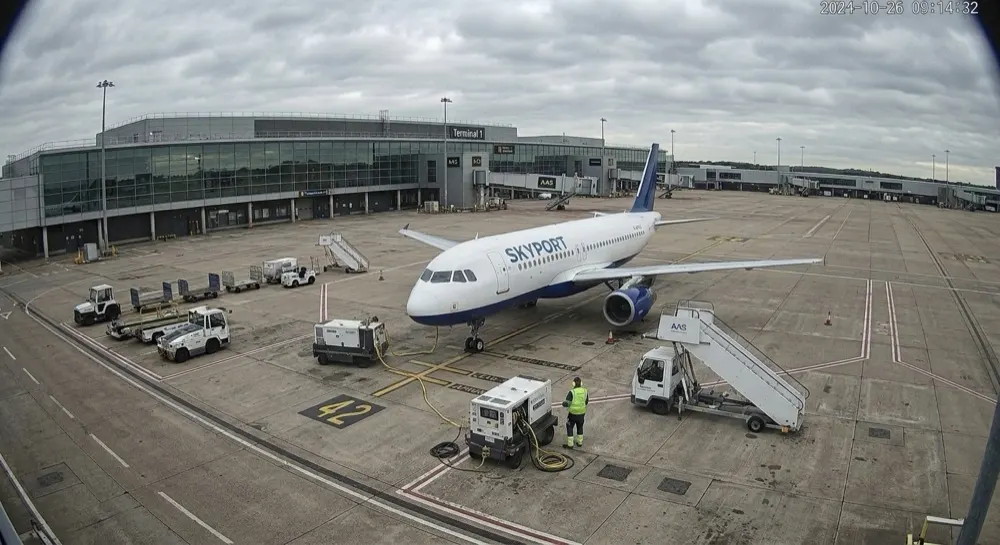 Unattended aircraft: Camera alert cleared by generative AI. Person escalated for analysis; Gen AI clears it — authorised hi-vis ground crew servicing the aircraft.